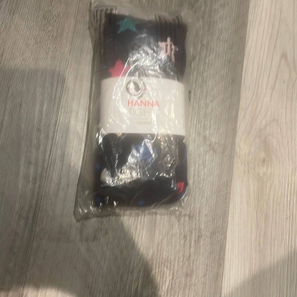 Girls footed Hanna Anderson tights.. never opened out the package